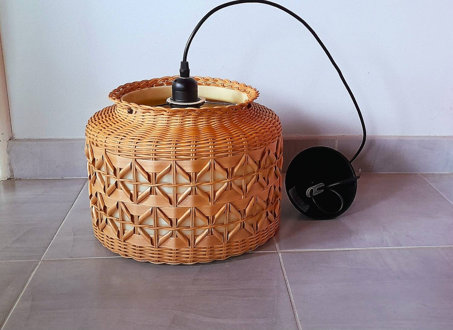 Woven wicker suspension, 1960.