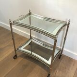 Neoclassical style rolling table in silver metal