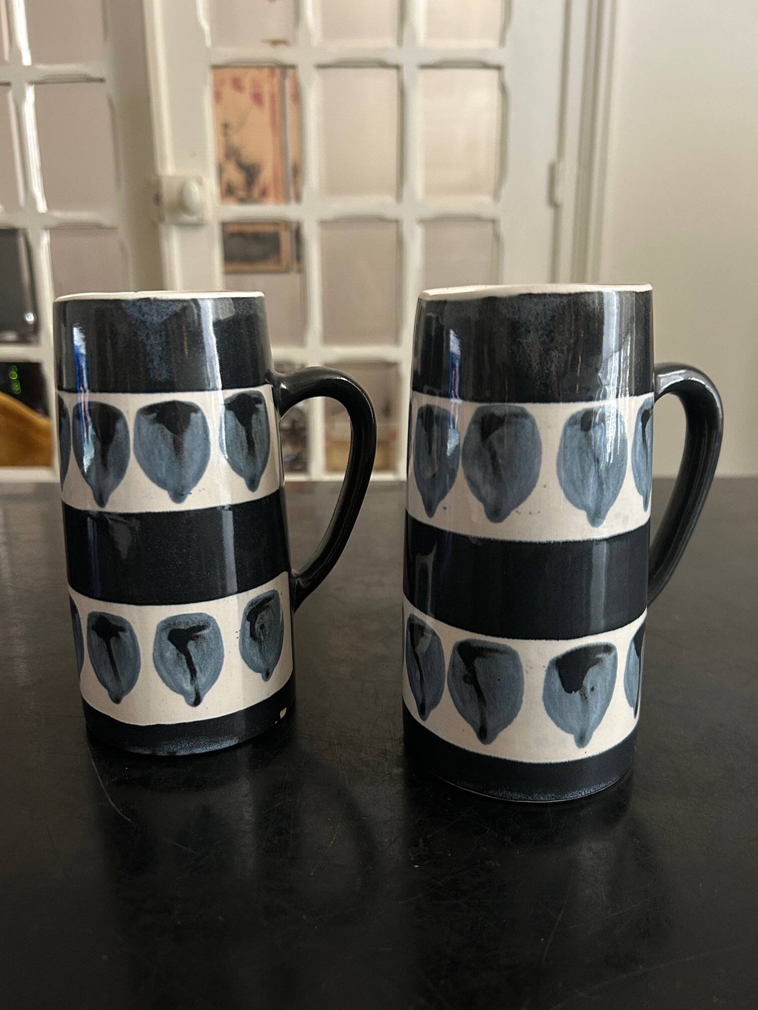 Two vintage ceramic mugs