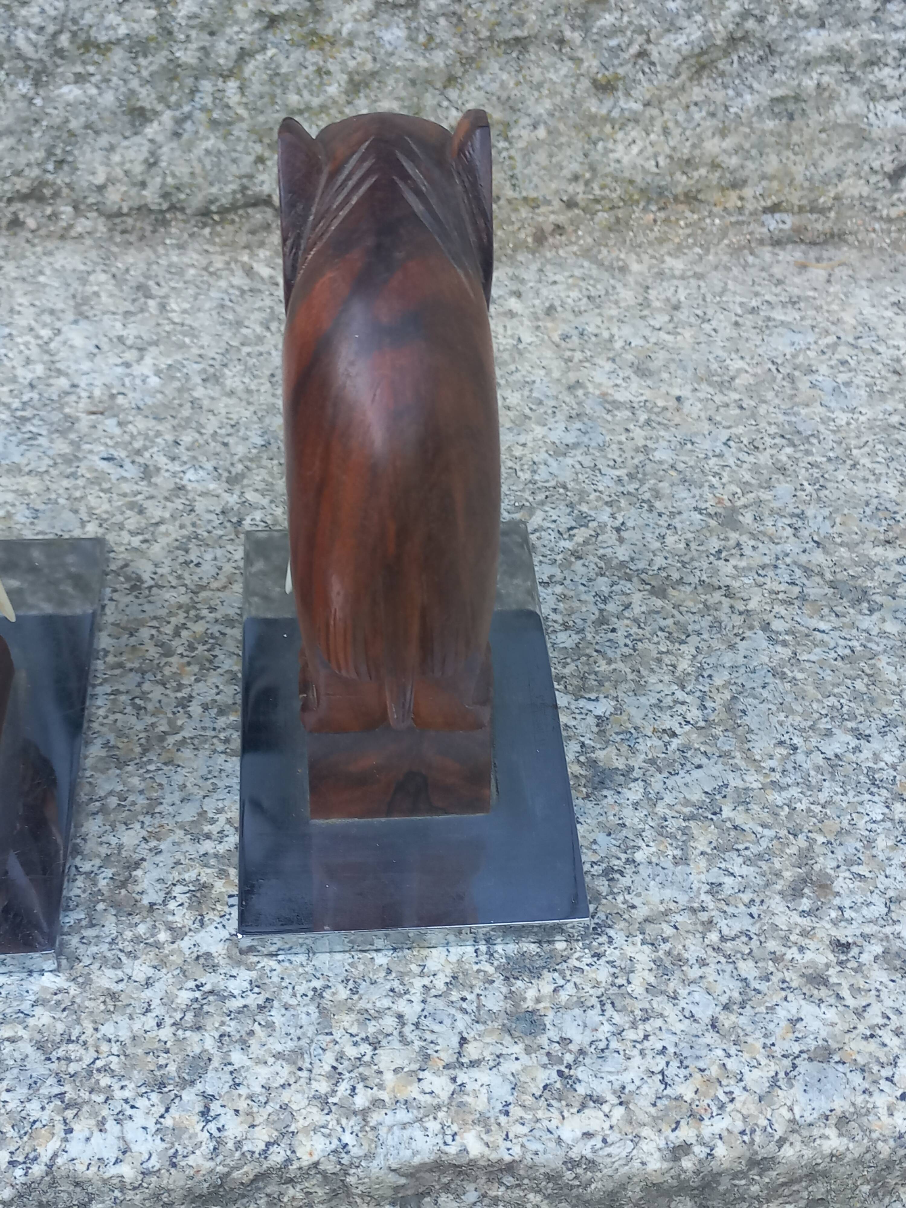 Pair of Art Deco elephant bookends in rosewood with chrome base.