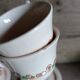 6 tasses et sous-tasses rose modèle Betty faïenc. de Longwy 1930