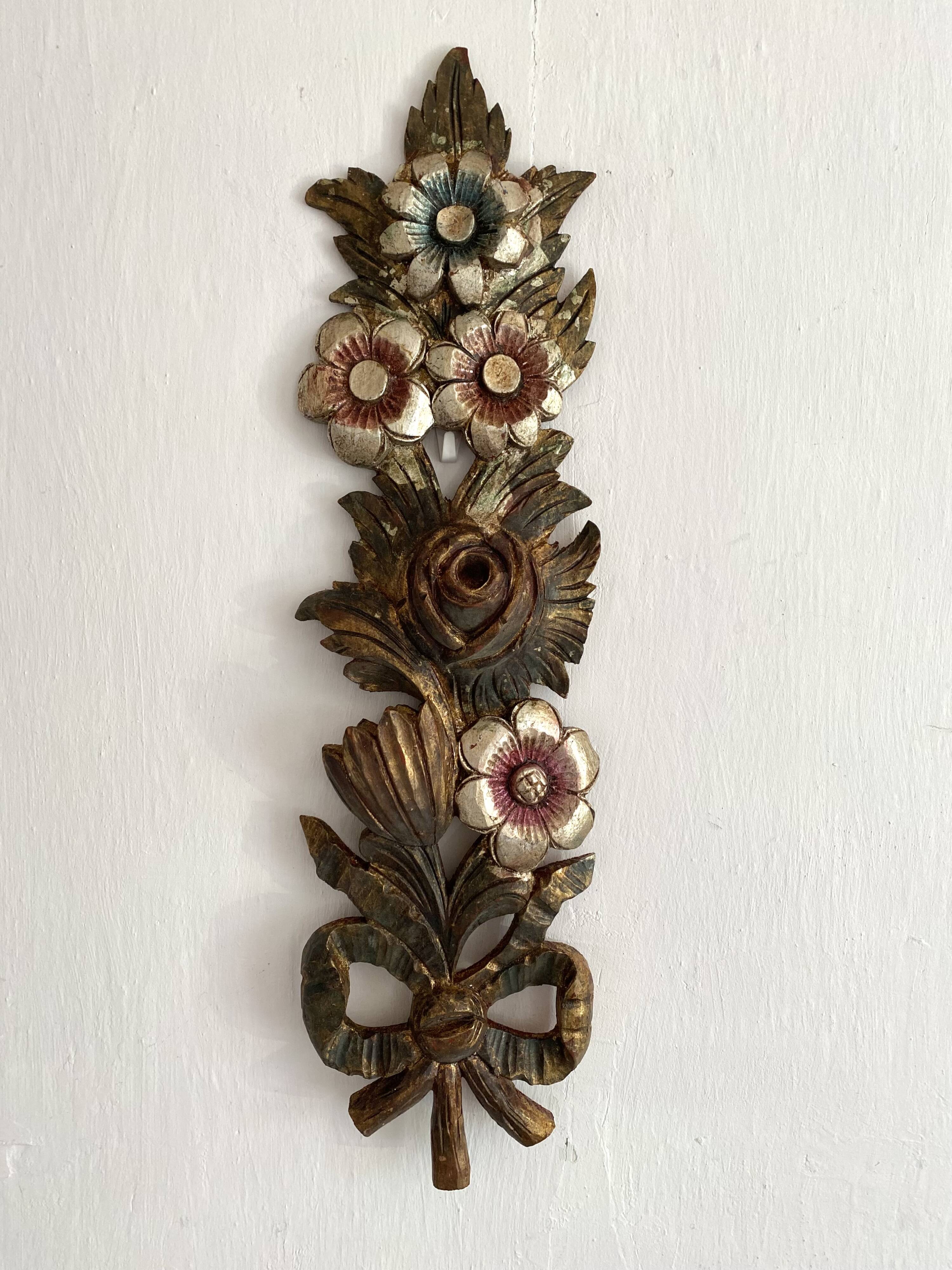 Decorative carved wooden ornament bouquet flowers and ribbon