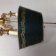 Pair of bronze and sheet metal hot water bottle wall lights