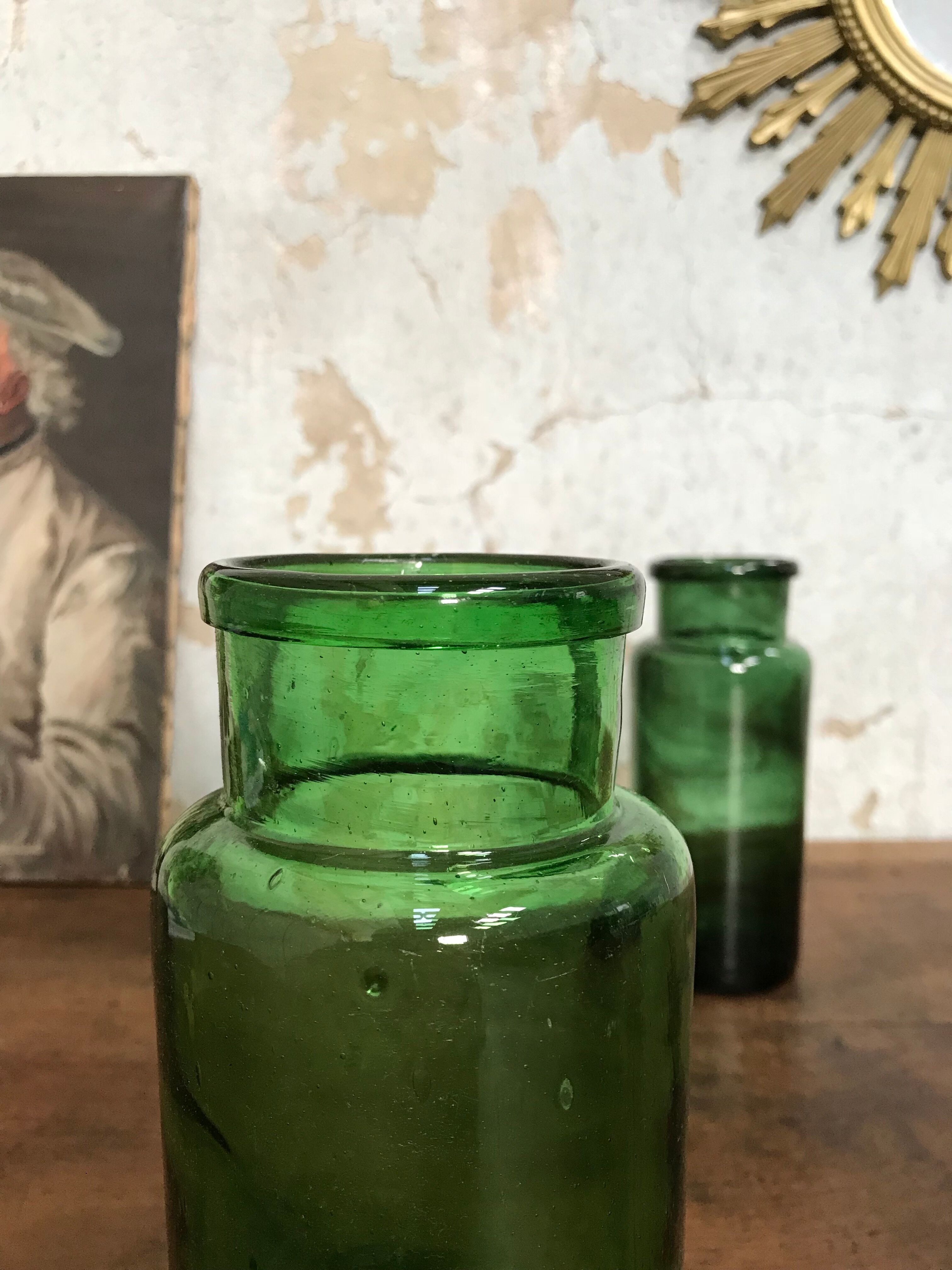 Green bubbled glass jars.