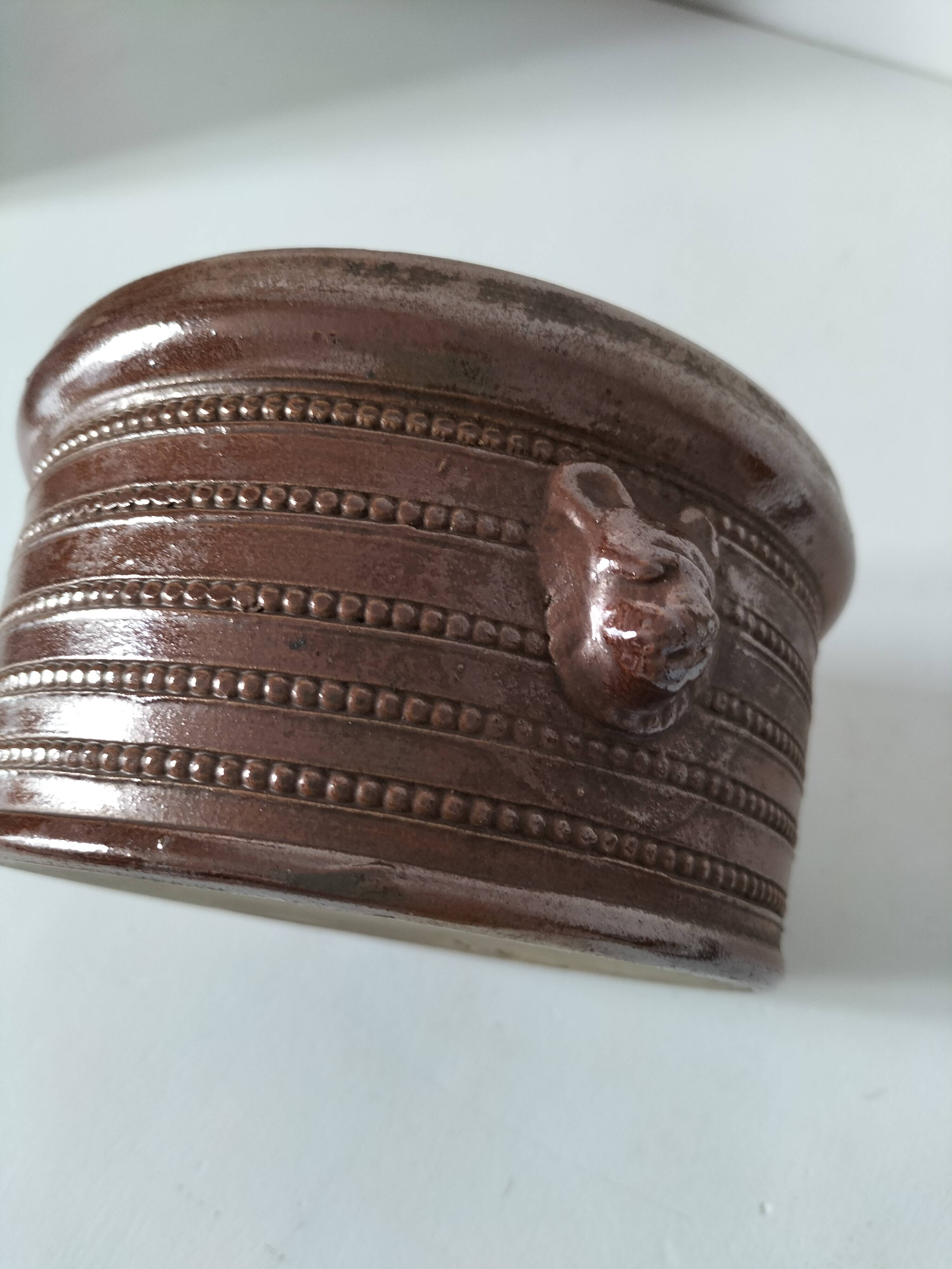 Stoneware pot Corneau Myennes decorated with hares