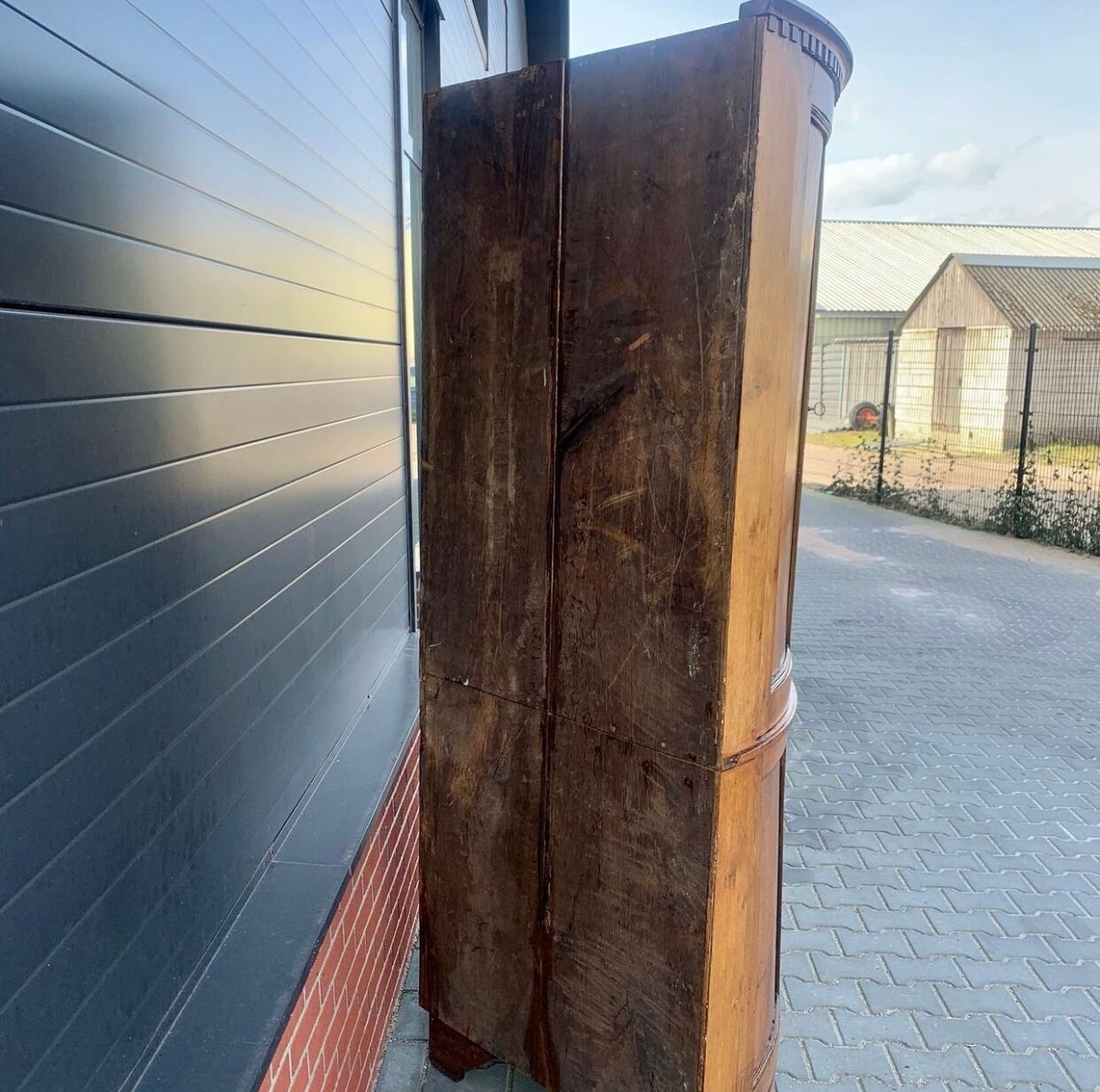 Louis Seize Oak corner cabinet with a quarter curved front