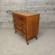 Vintage chest of drawers with tapered legs