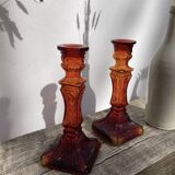 Pair of amber glass candlesticks