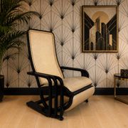 Rocking lounge chair, curved wood, leather, Viennese cane design.