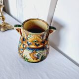 Antique majolica water pitcher made in Italy and hand painted.