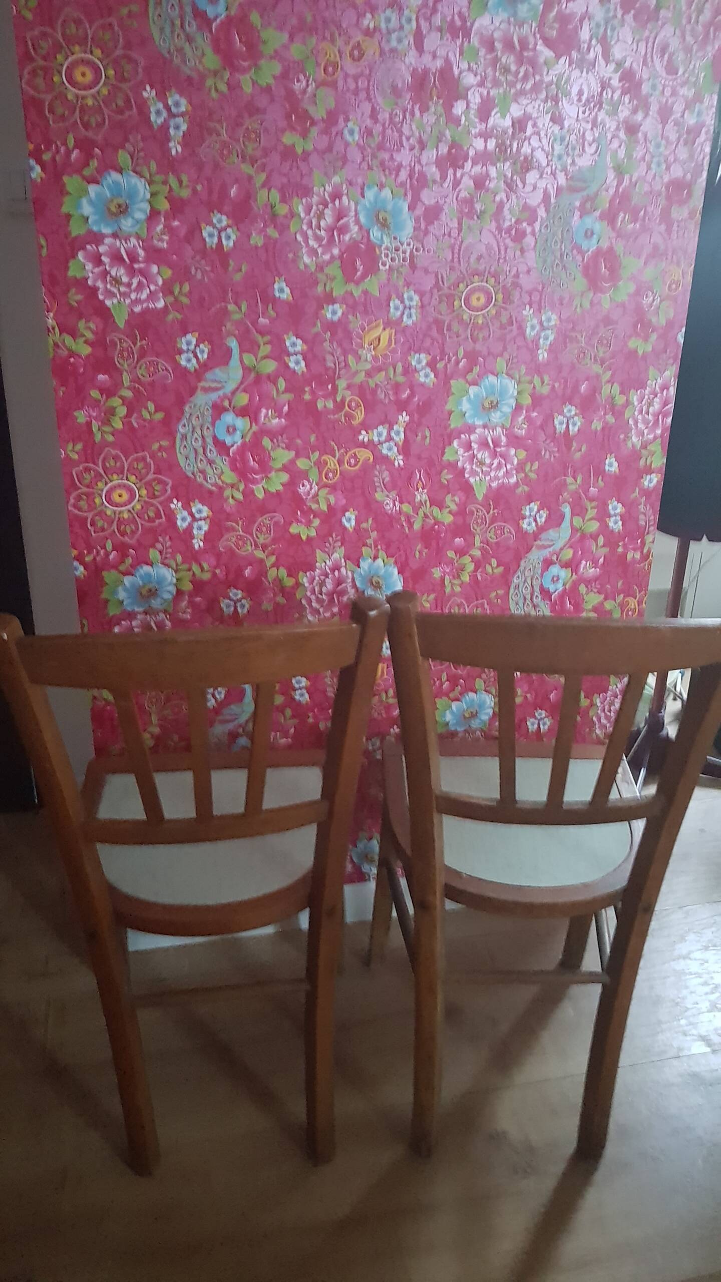Vintage 70s chairs with wooden frames and blue formica seats.