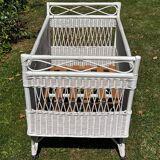 Vintage wicker bed with casters from the 50s in perfect condition