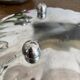 Stainless steel dish with ball feet 32 cm