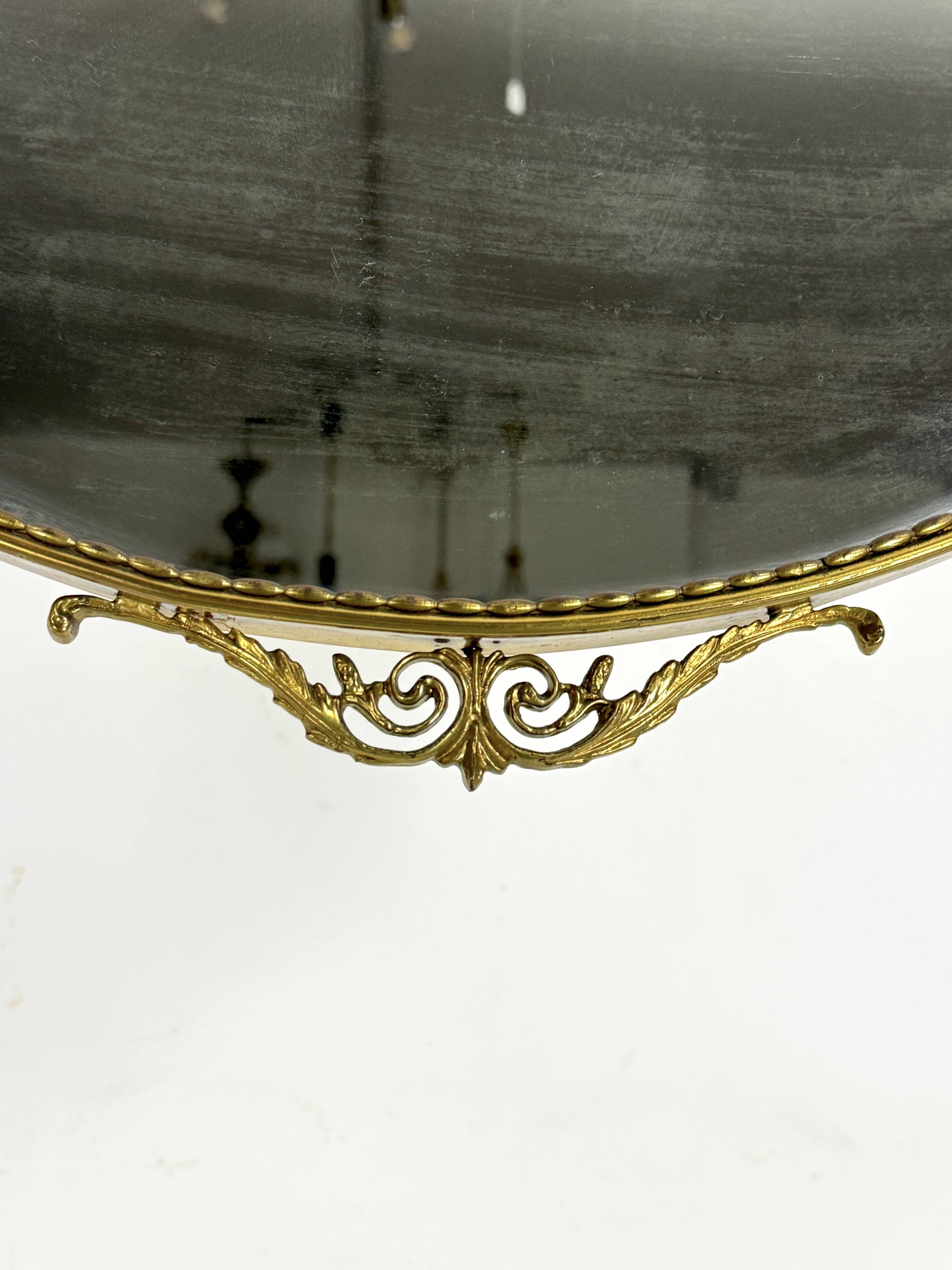 Mid-century Italian mirror in brass. Italy 1950s