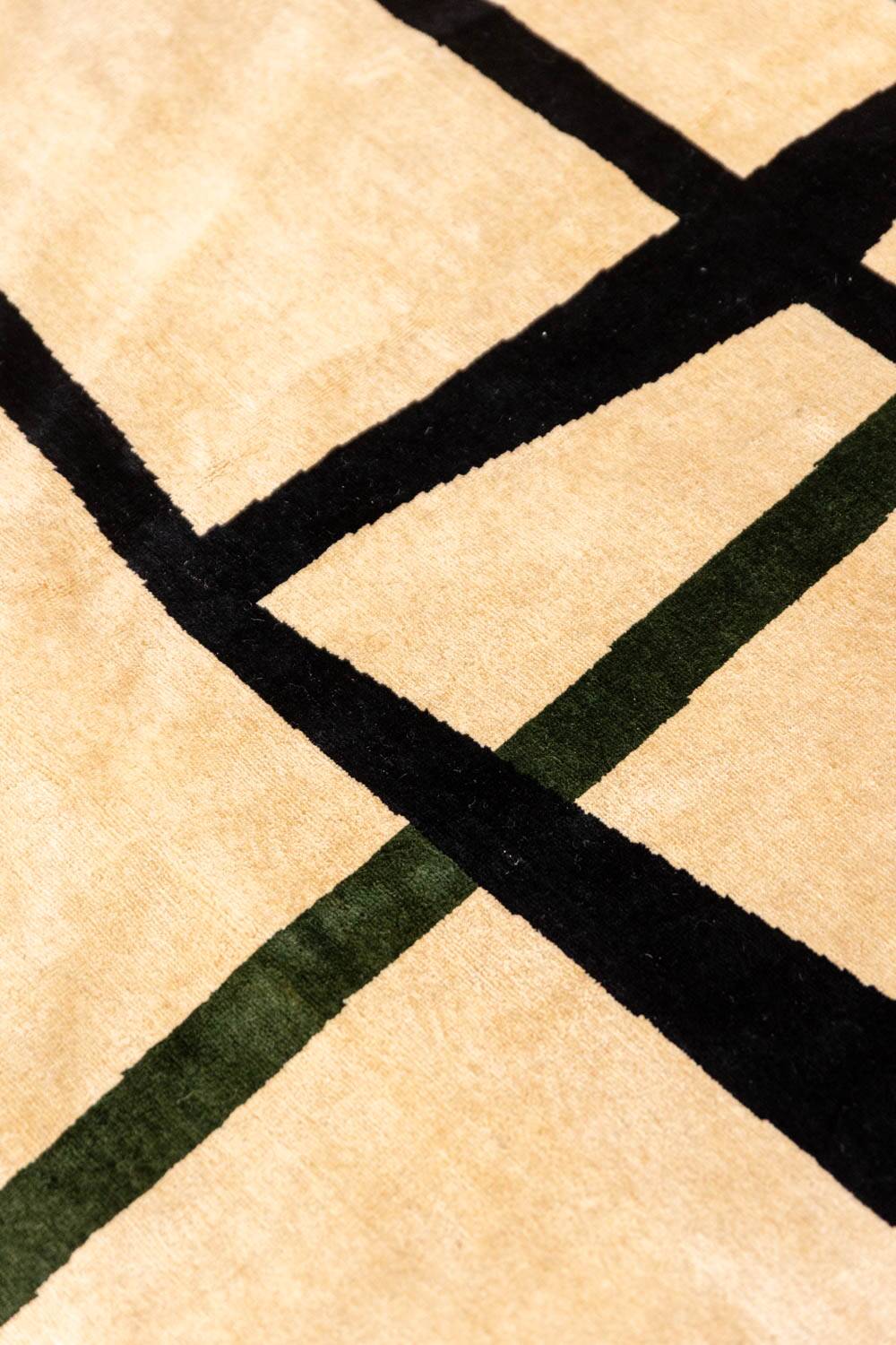 Handwoven wool tapestry with colourful geometric design. 2026.