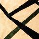 Handwoven wool tapestry with colourful geometric design. 2026.