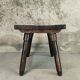 Small vintage coffee table made of solid wood.