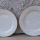 2 plats ronds porcelaine de Limoges bordure dorée