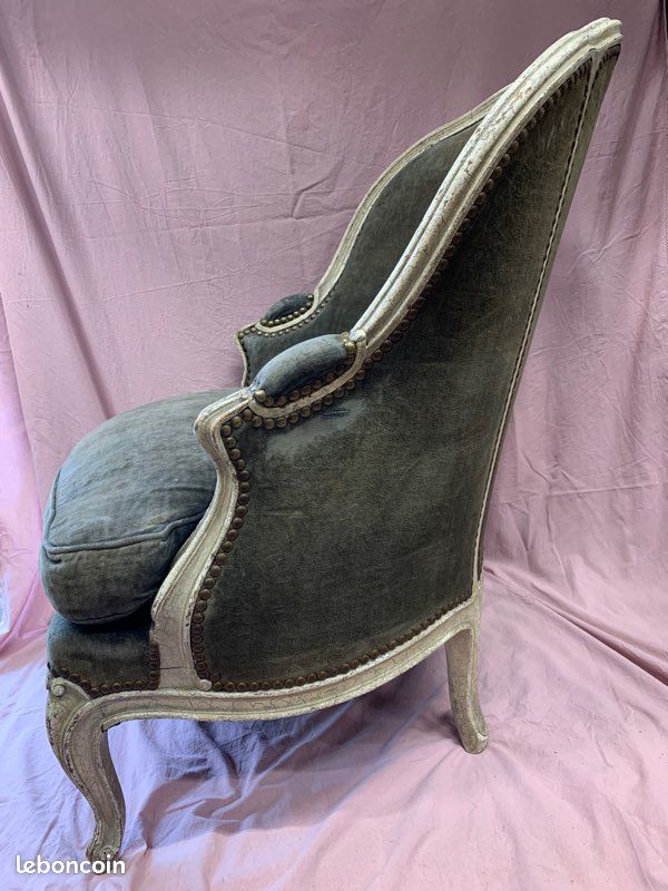 Green velvet shepherdess armchair