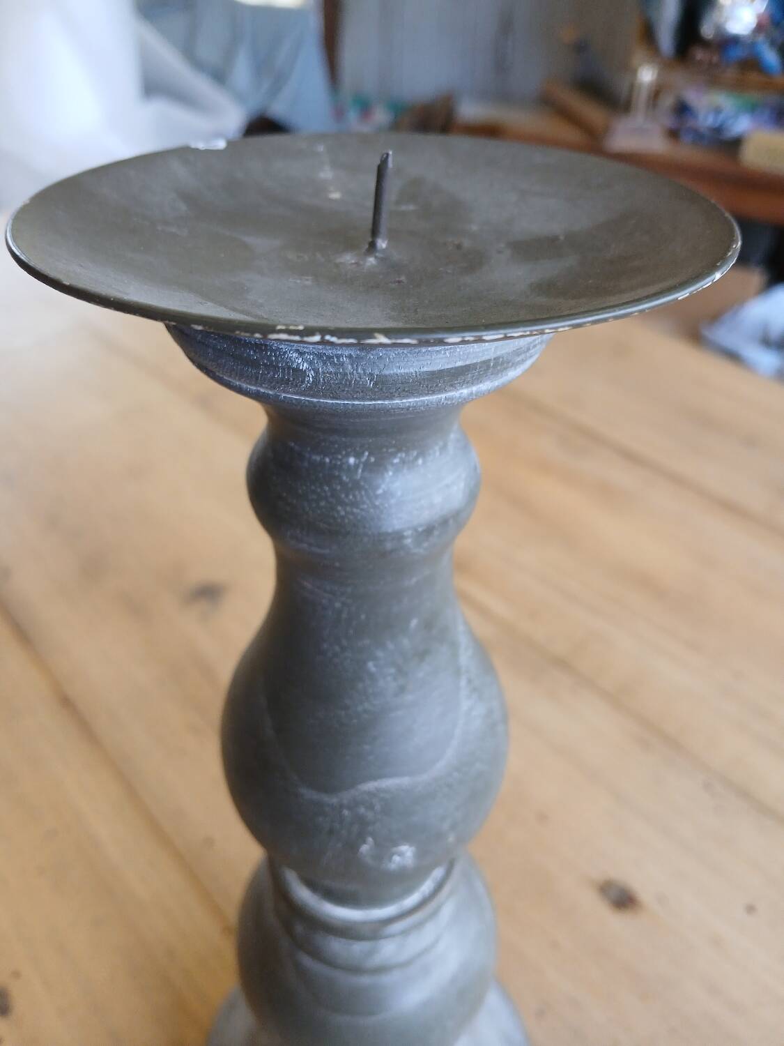 Candle holder in patinated wood