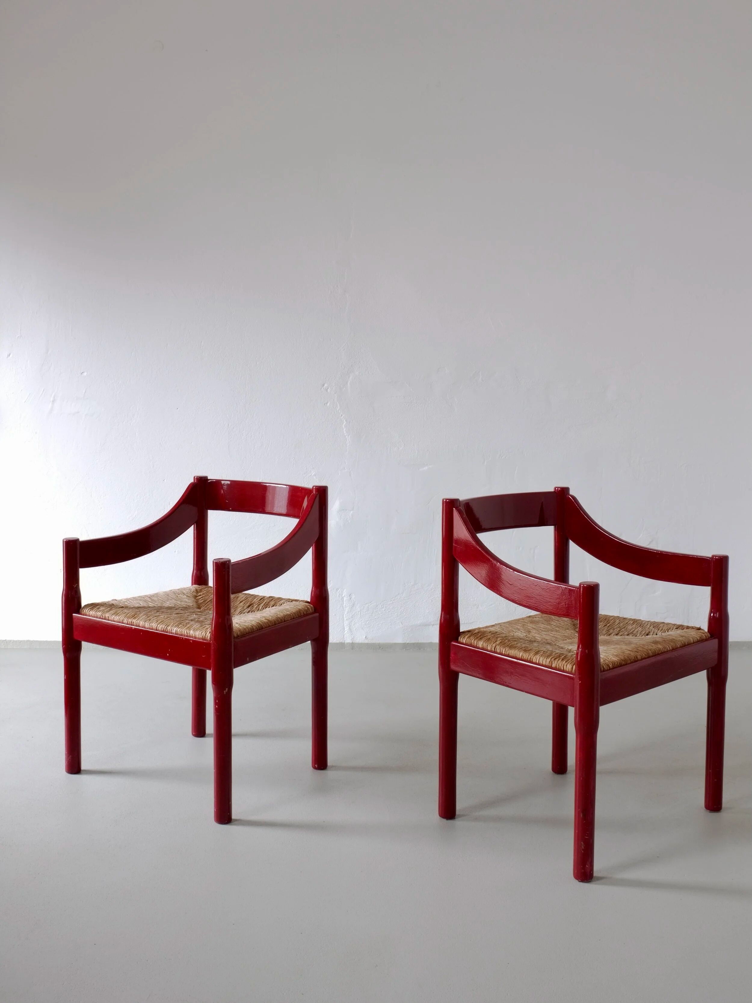 2 red Vico Magistretti “Carimate” style armchairs | Italy | 1970s