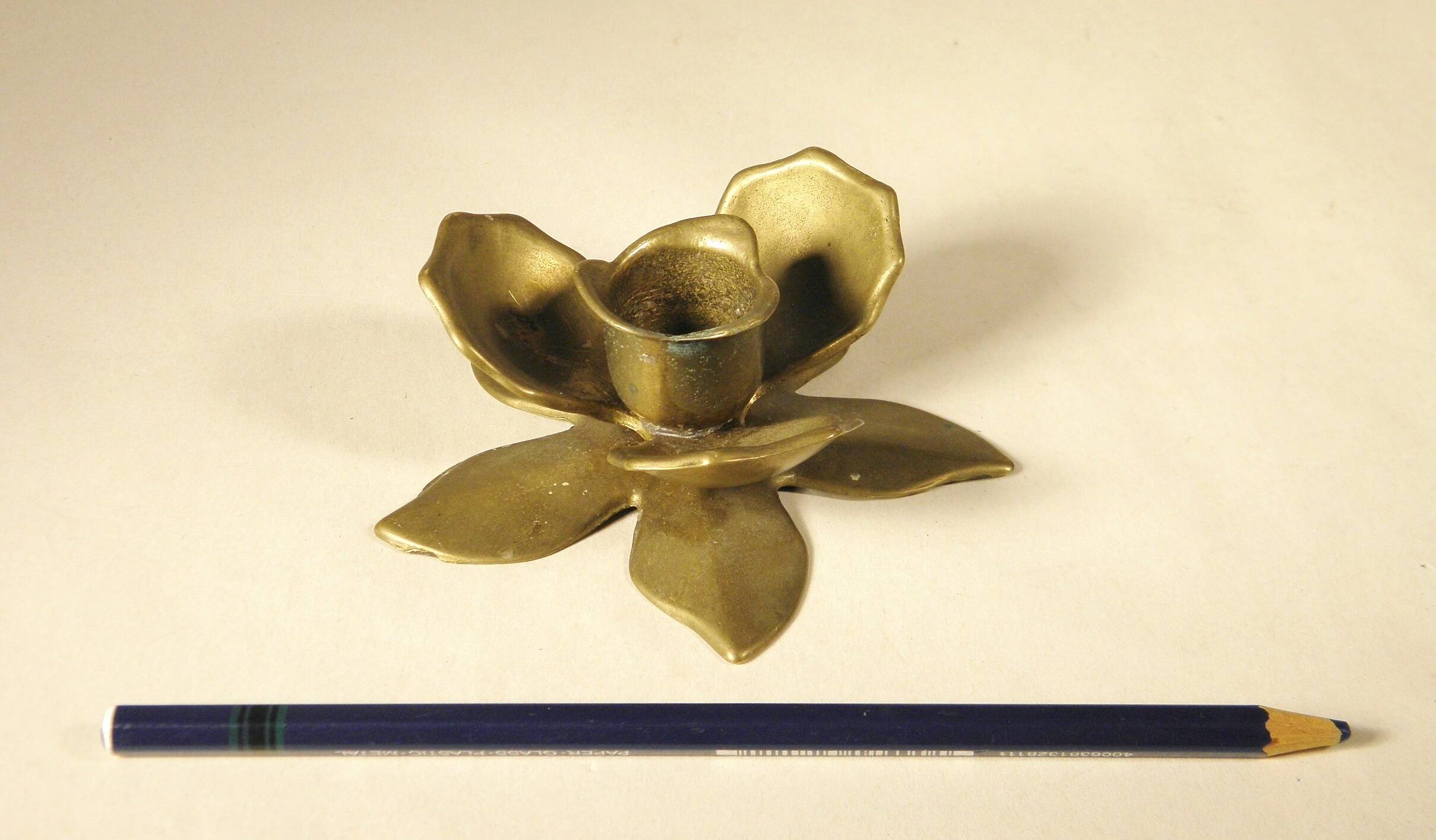 Brass flower candle holder