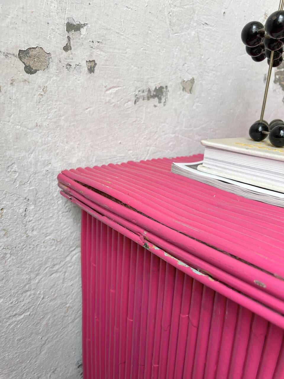 Vintage pink rattan chest of drawers