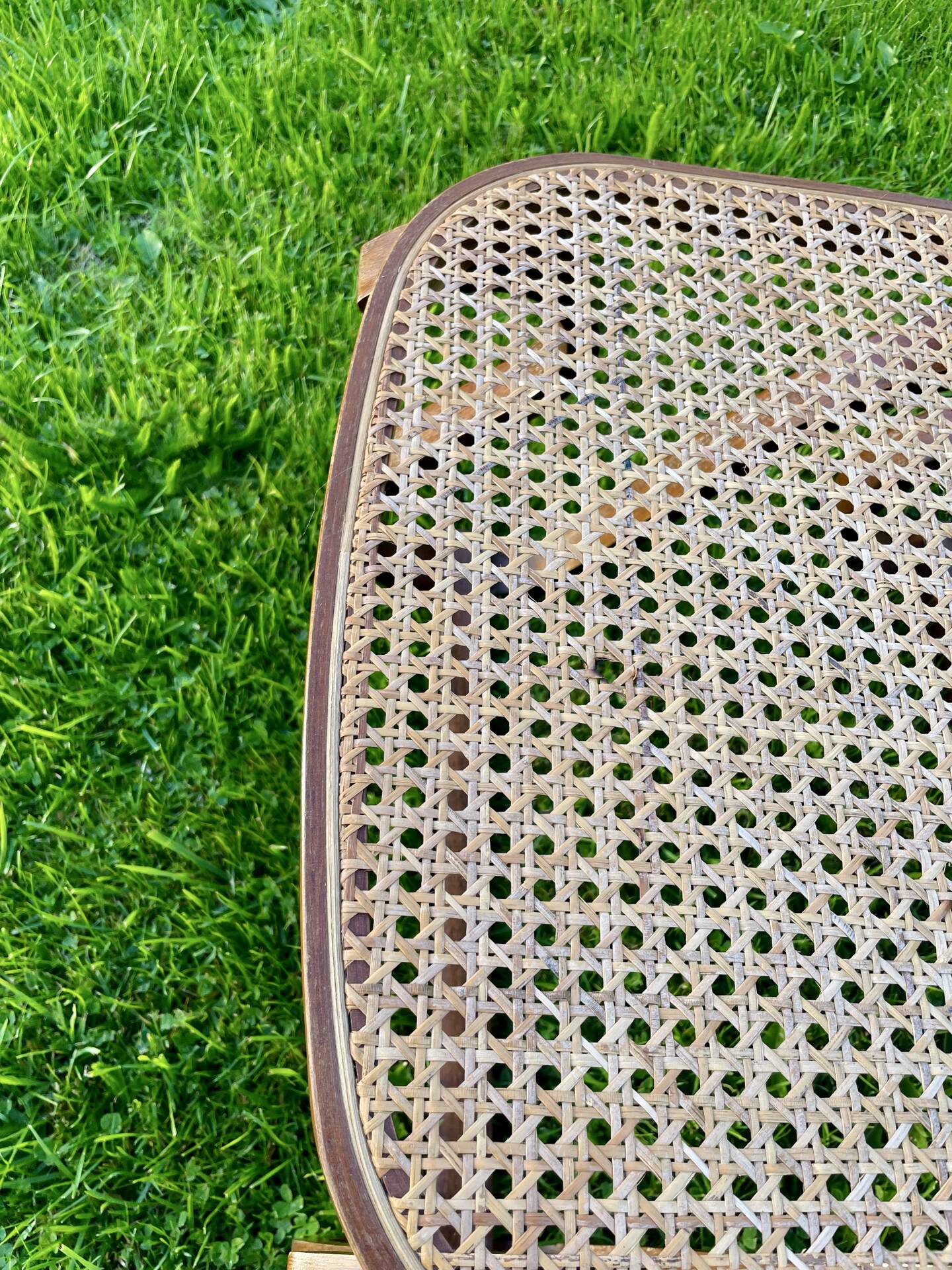 Rocking-chair en bois courbé et cannage