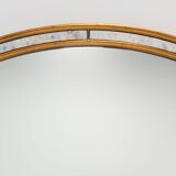 Mirror by Deknudt with marbled fume glass side panels in gilded wooden fram