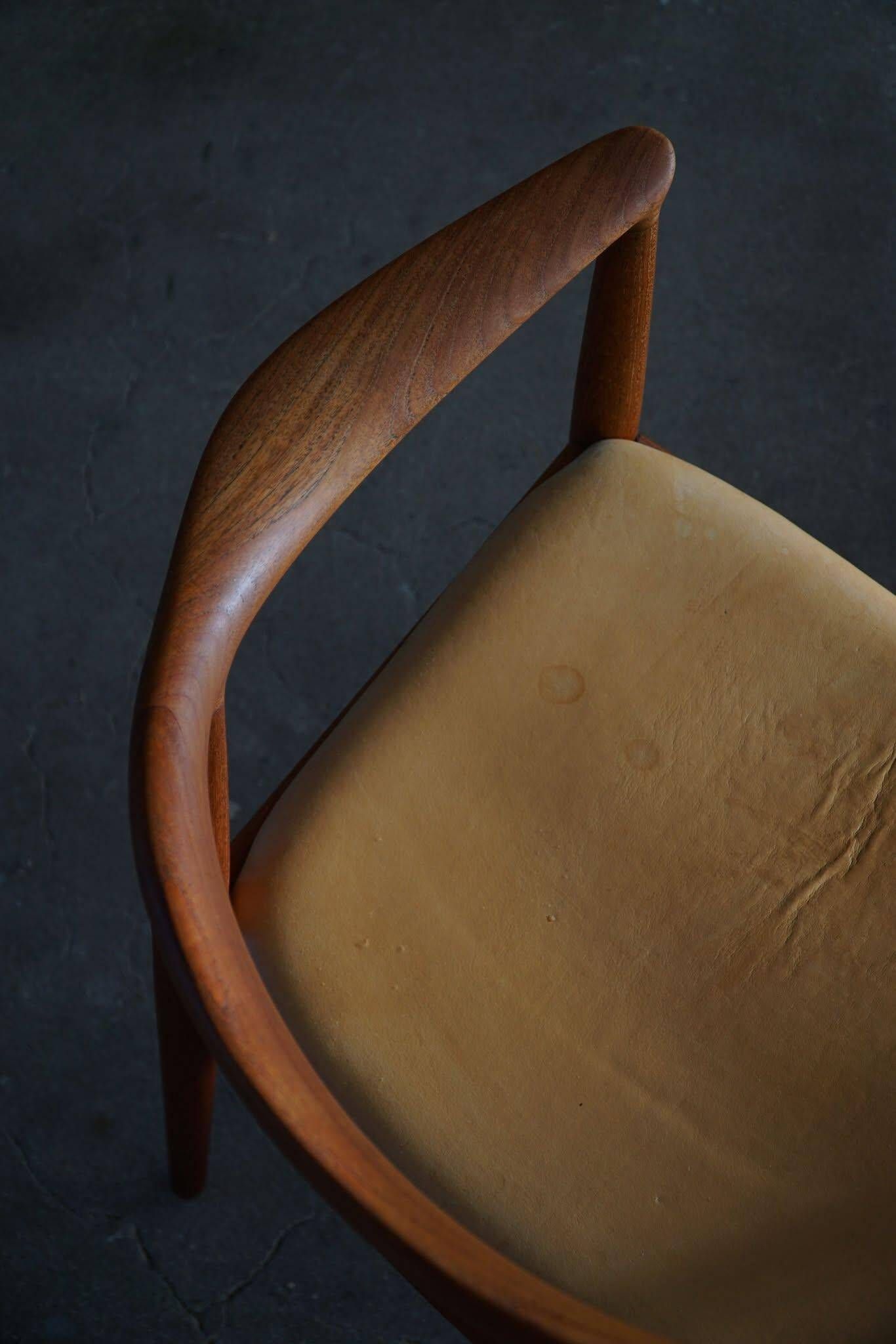 Hans J. Wegner, Teak and leather armchair, model "The Chair" JH501, 1950s