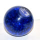 Vintage plastic paper press in cobalt blue
