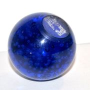 Vintage plastic paper press in cobalt blue