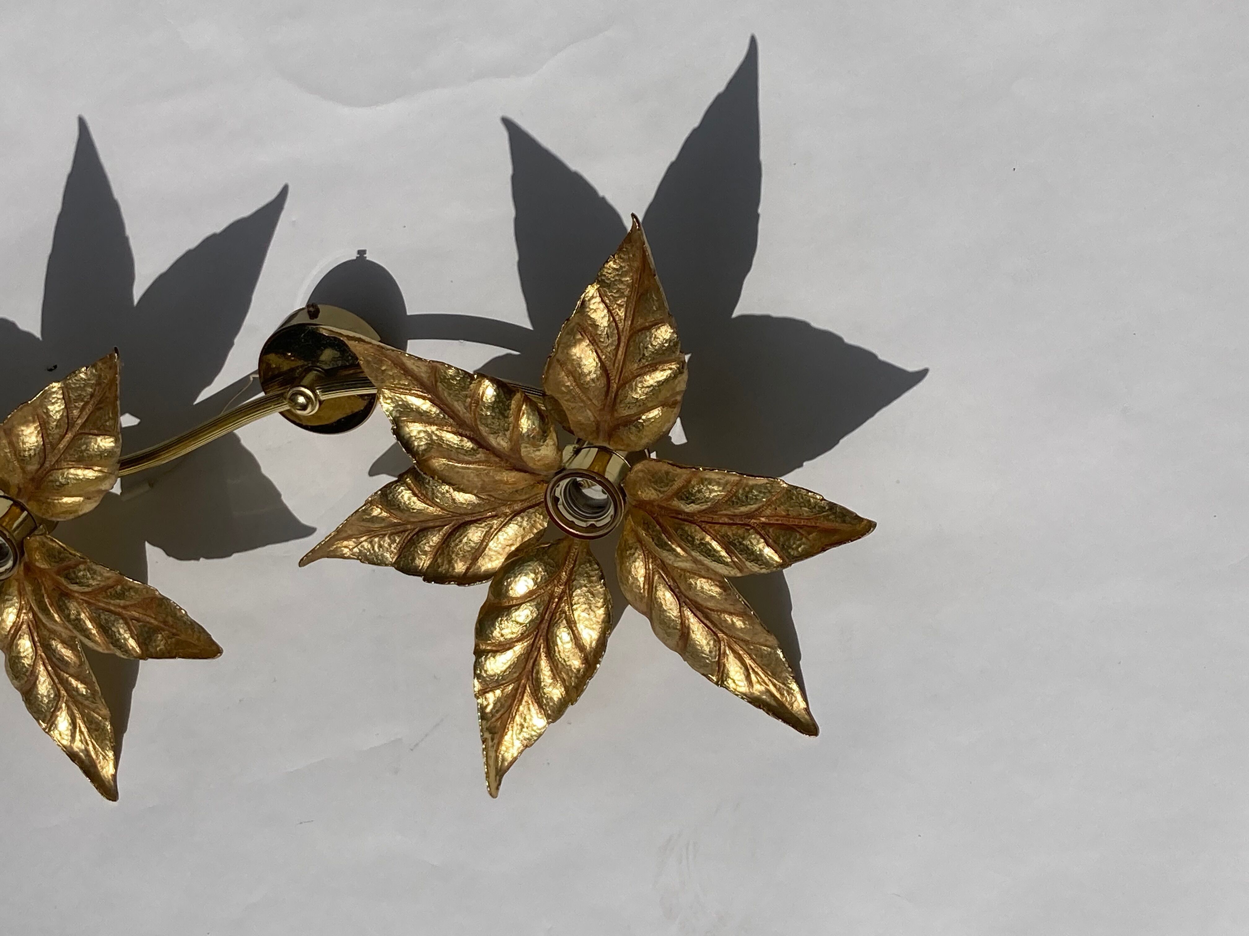 Hollywood regency brass floral wall sconce by Willy Daro
