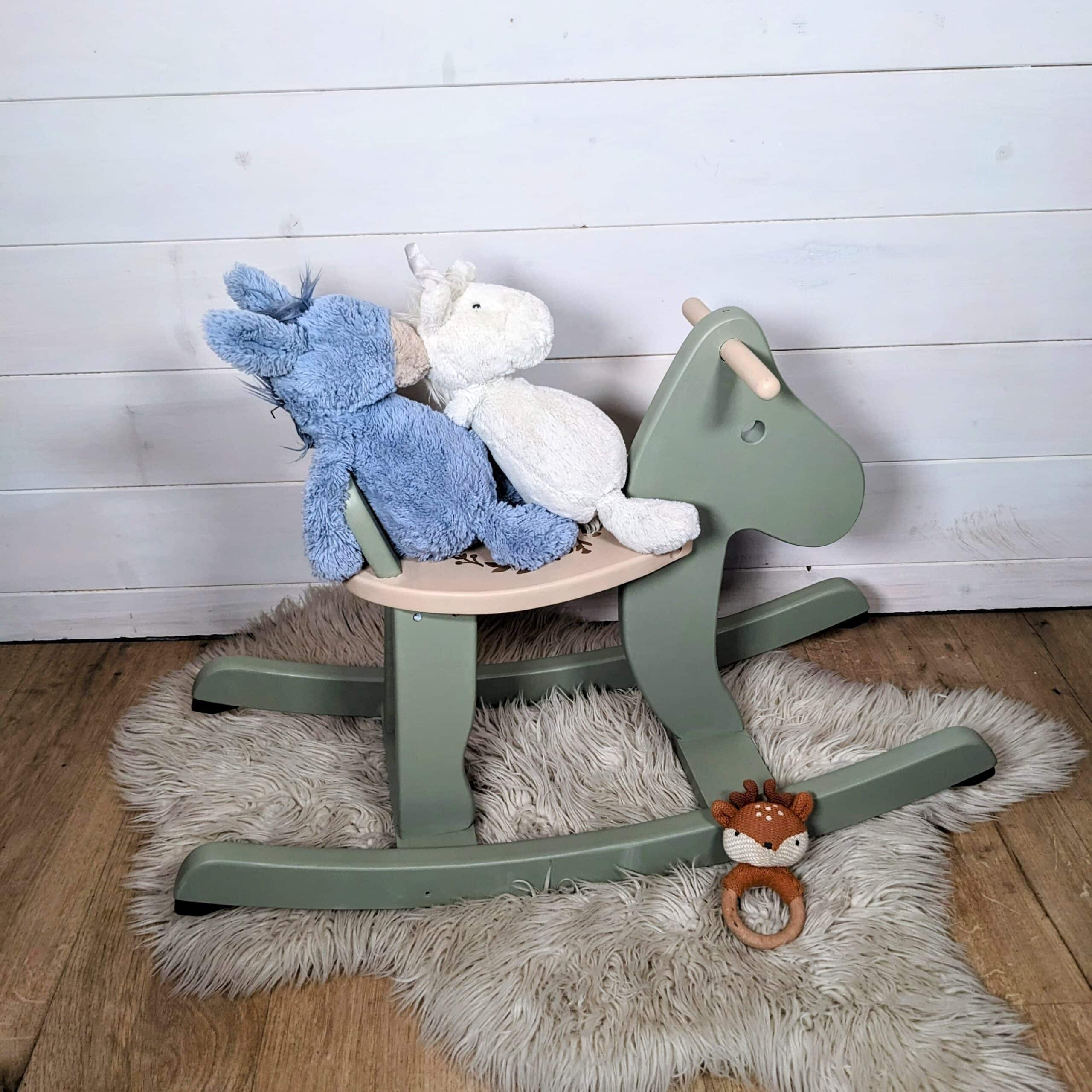 Green and beige wooden rocking horse