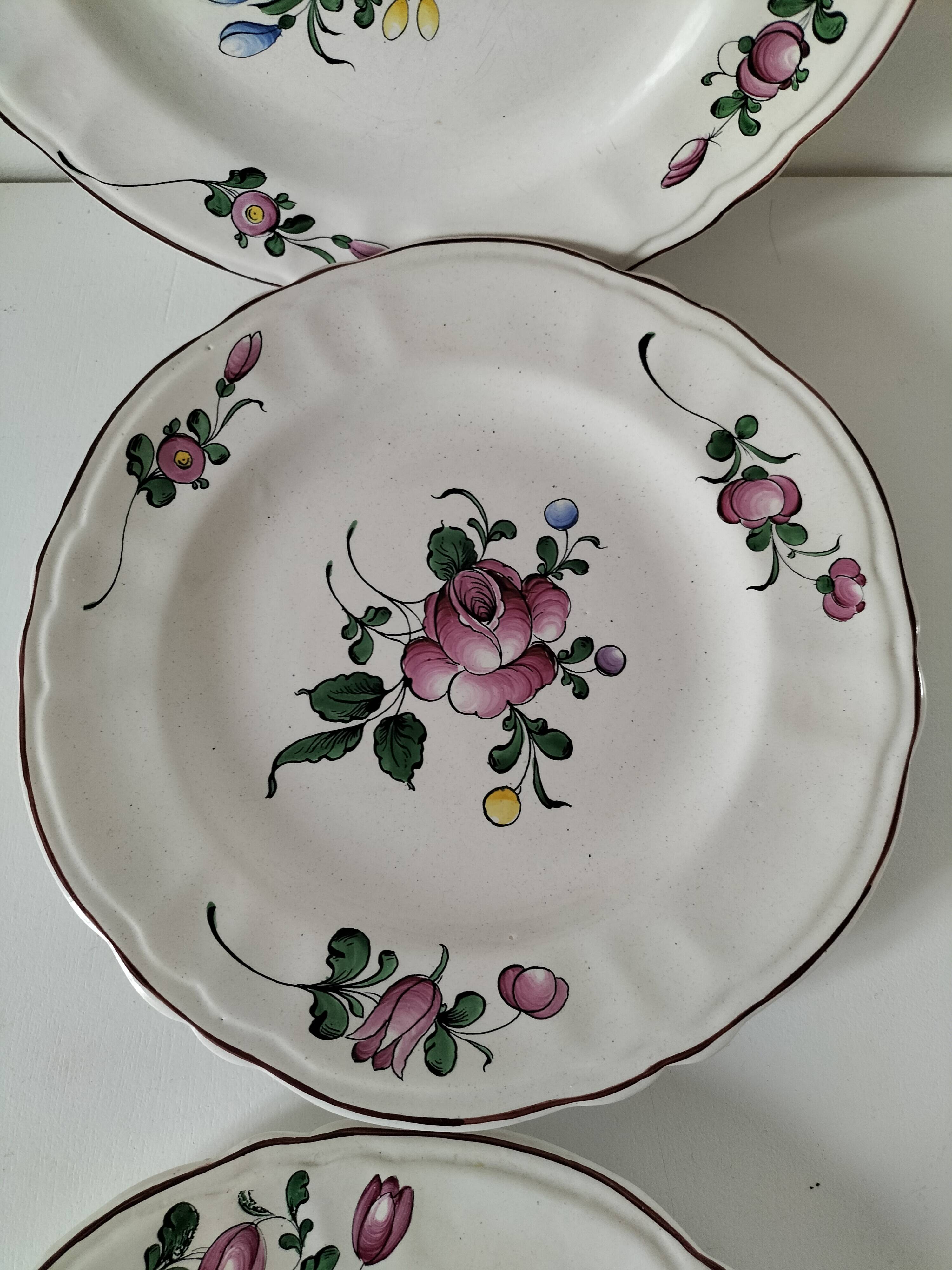 Trio of antique hand-painted plates