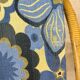 Fauteuil vintage en rotin et tissu à fleurs