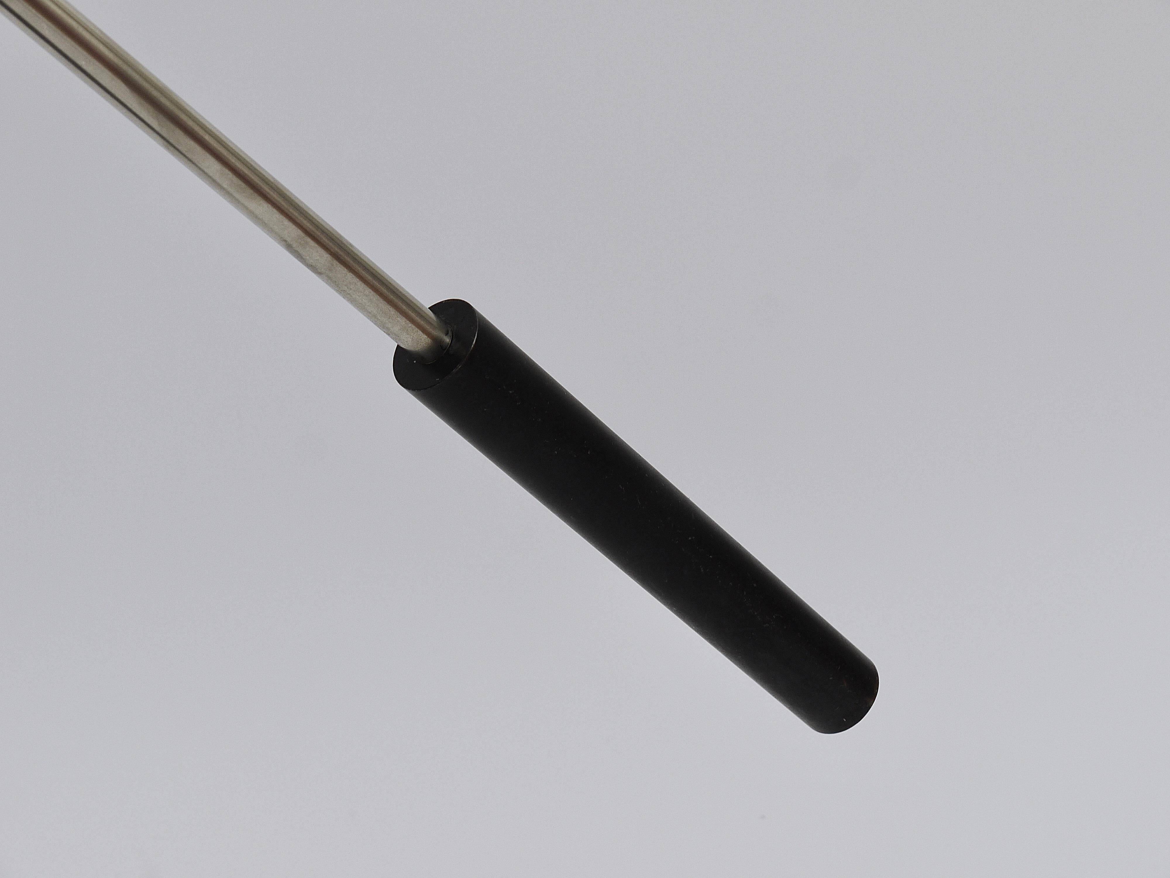 Articulated floor lamp with counterweight mid-century by Rupert Nikoll, nickel, brass.