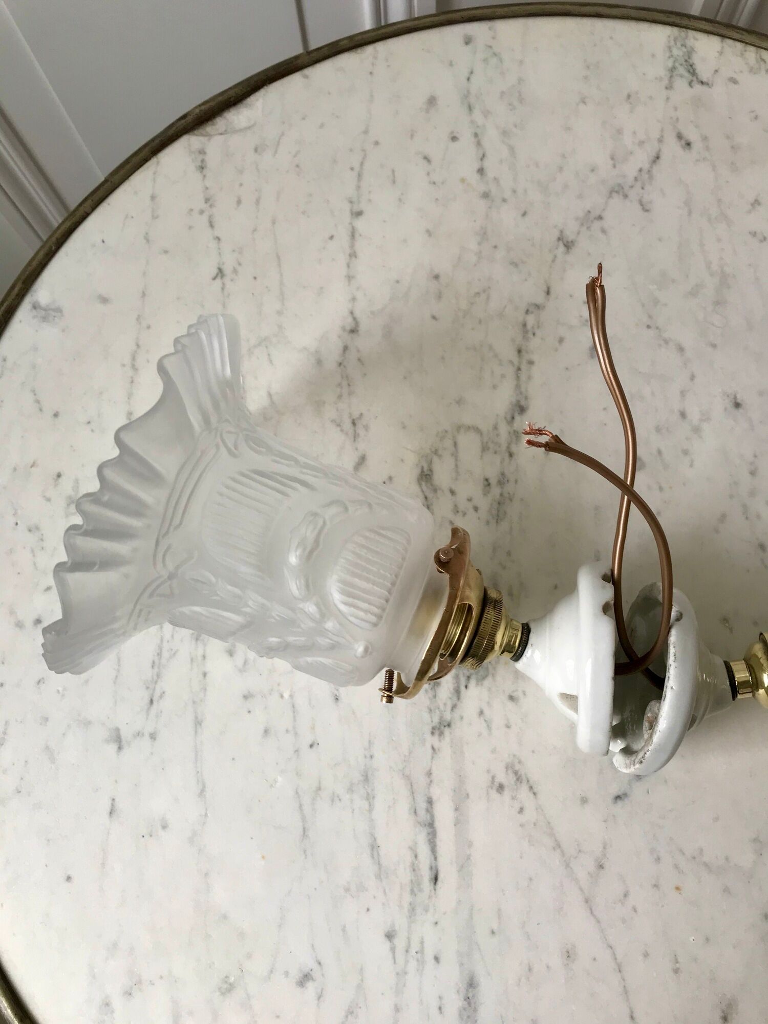 Pair of tulip wall lamps in molded glass on porcelain support 20s