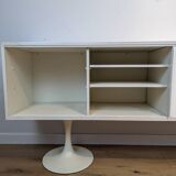 A vintage mid century space age sideboard with white sliding doors