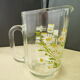 Pitcher, water carafe or glass fruit juice with hand-painted floral decoration