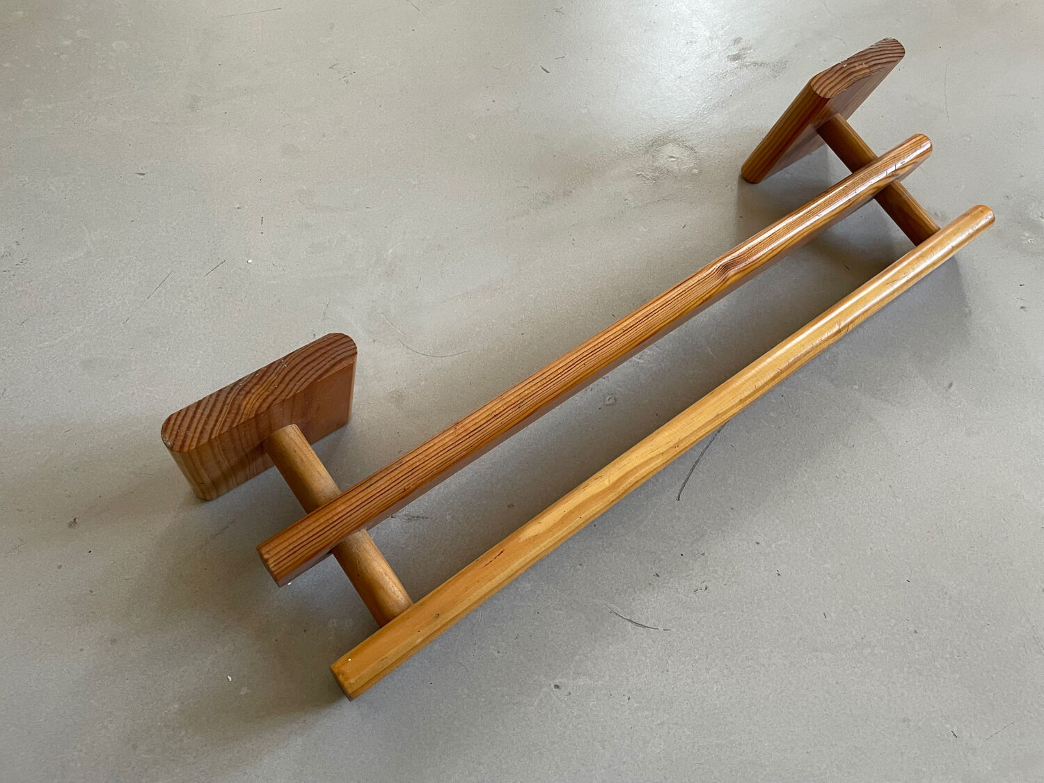 Wooden wall-mounted towel rack