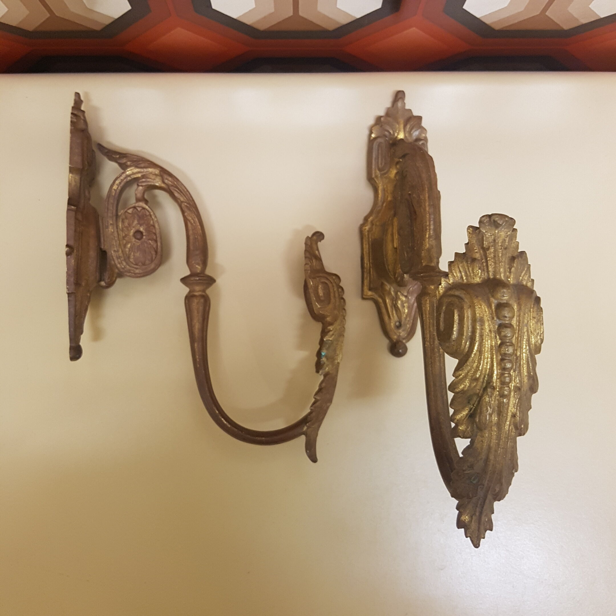 Pair of gilt bronze pegs