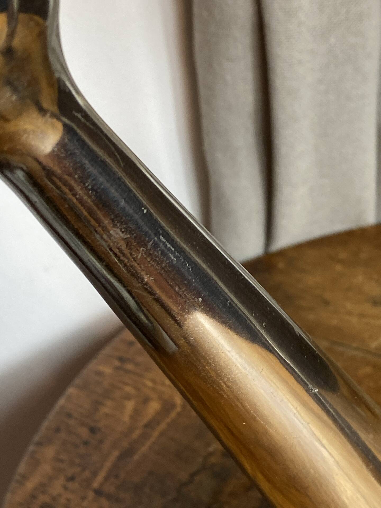 Pair of polished aluminium candlesticks