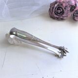 Ice cube pliers or sugar in's feet chiseled silver metal and punches