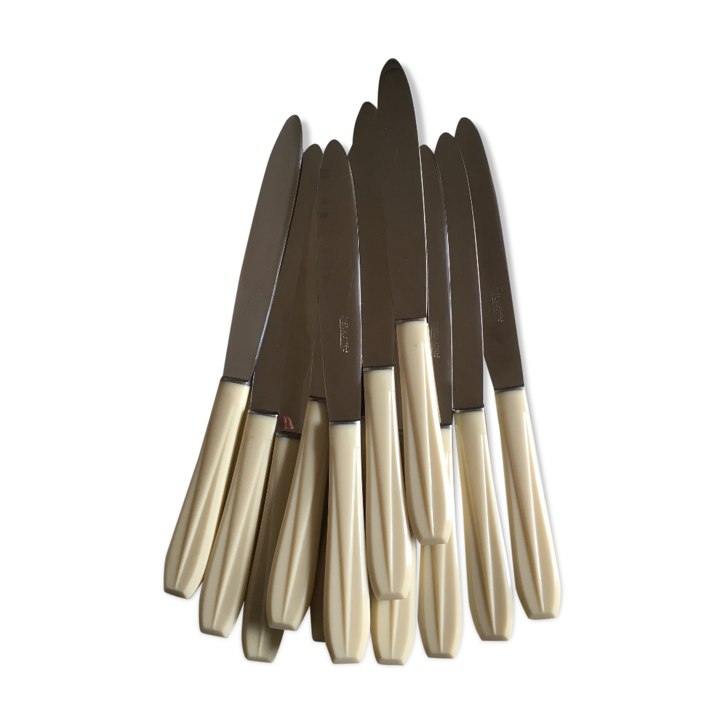 Set of 12 knives in white bakelite 50s