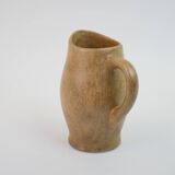 Small brown stoneware pitcher