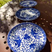 Small vintage plates made in Japan in blue and white porcelain.