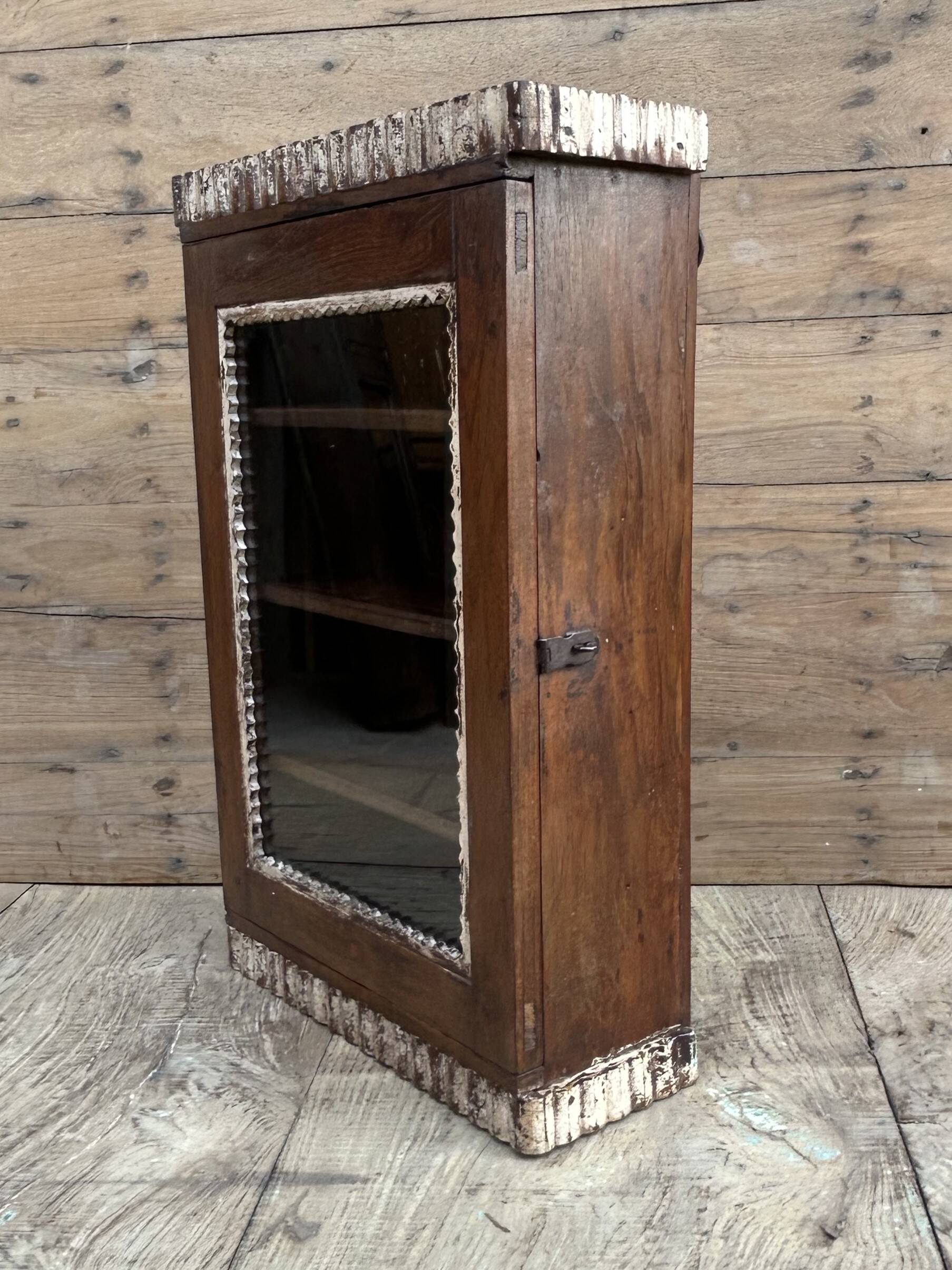 Art Deco wall display cabinet in Burmese teak with original patina.