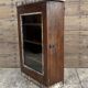 Art Deco wall display cabinet in Burmese teak with original patina.