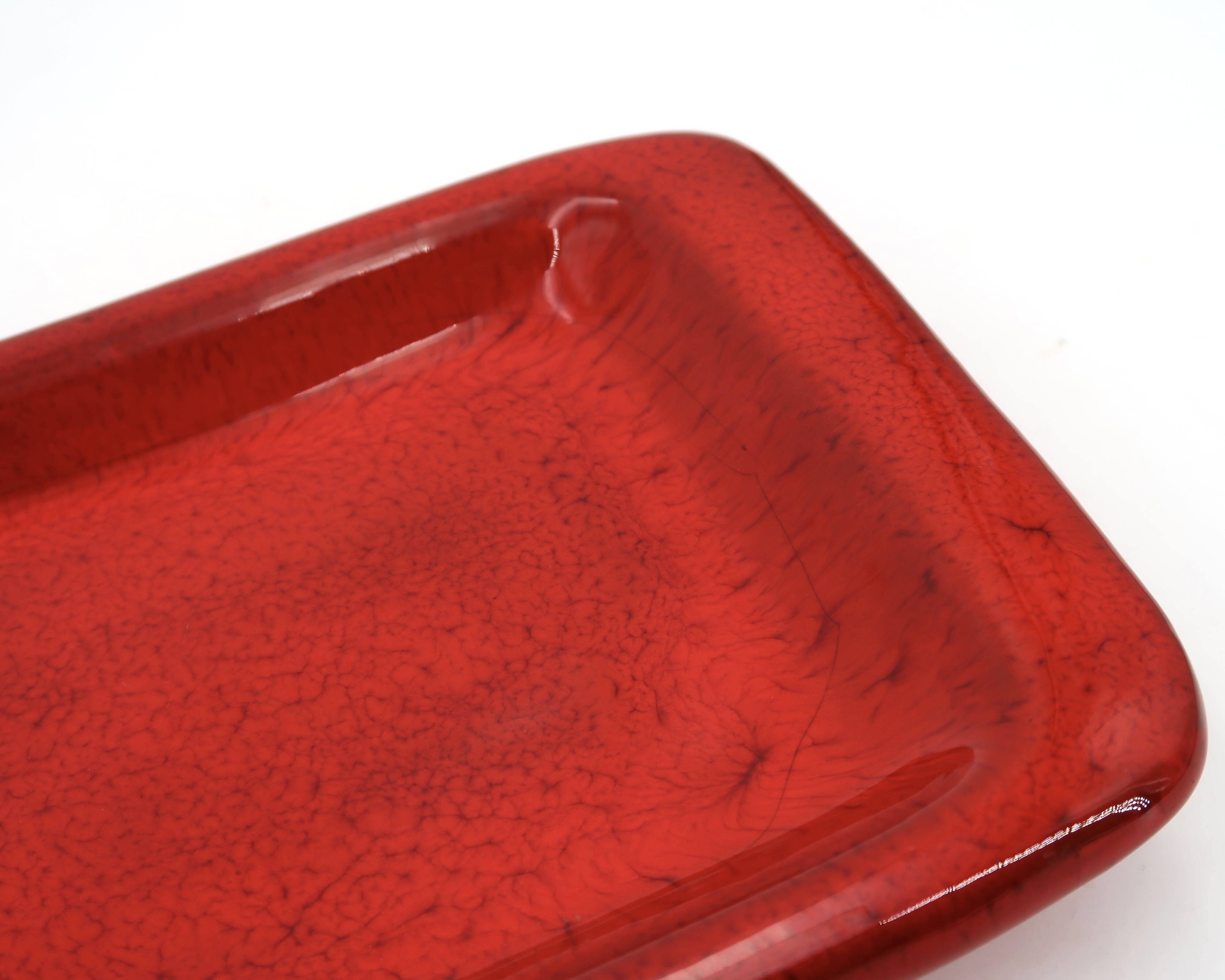 Rectangular ceramic catchall in red by Jean and Robert Cloutier.